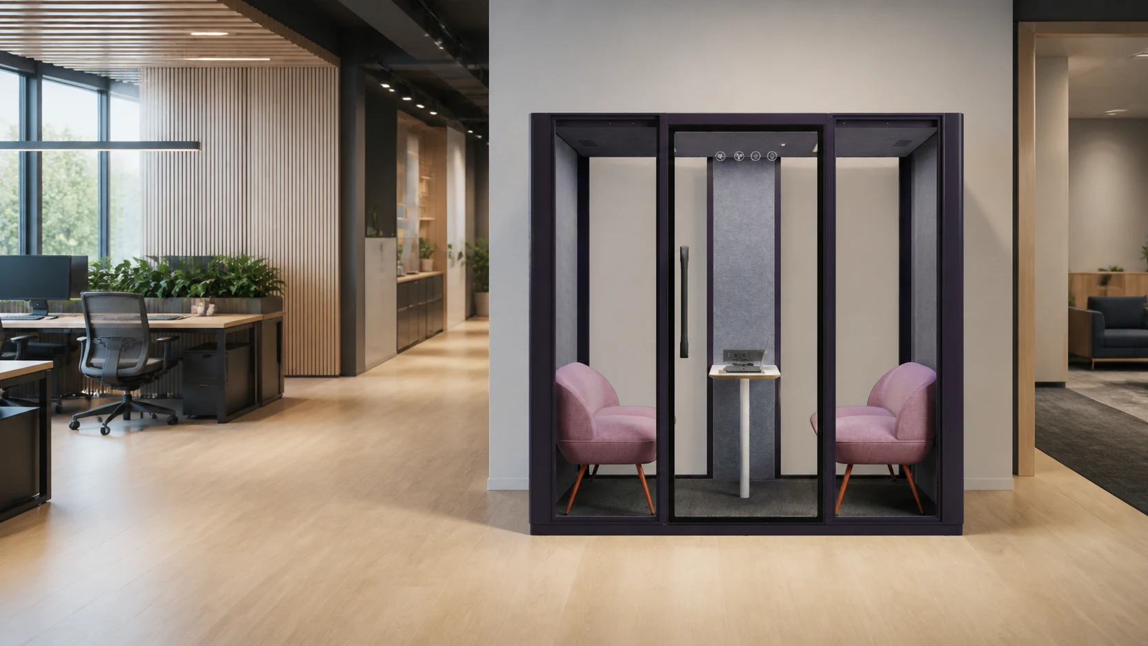 A collaboration pod placed beside a clear commercial-office circulation route
