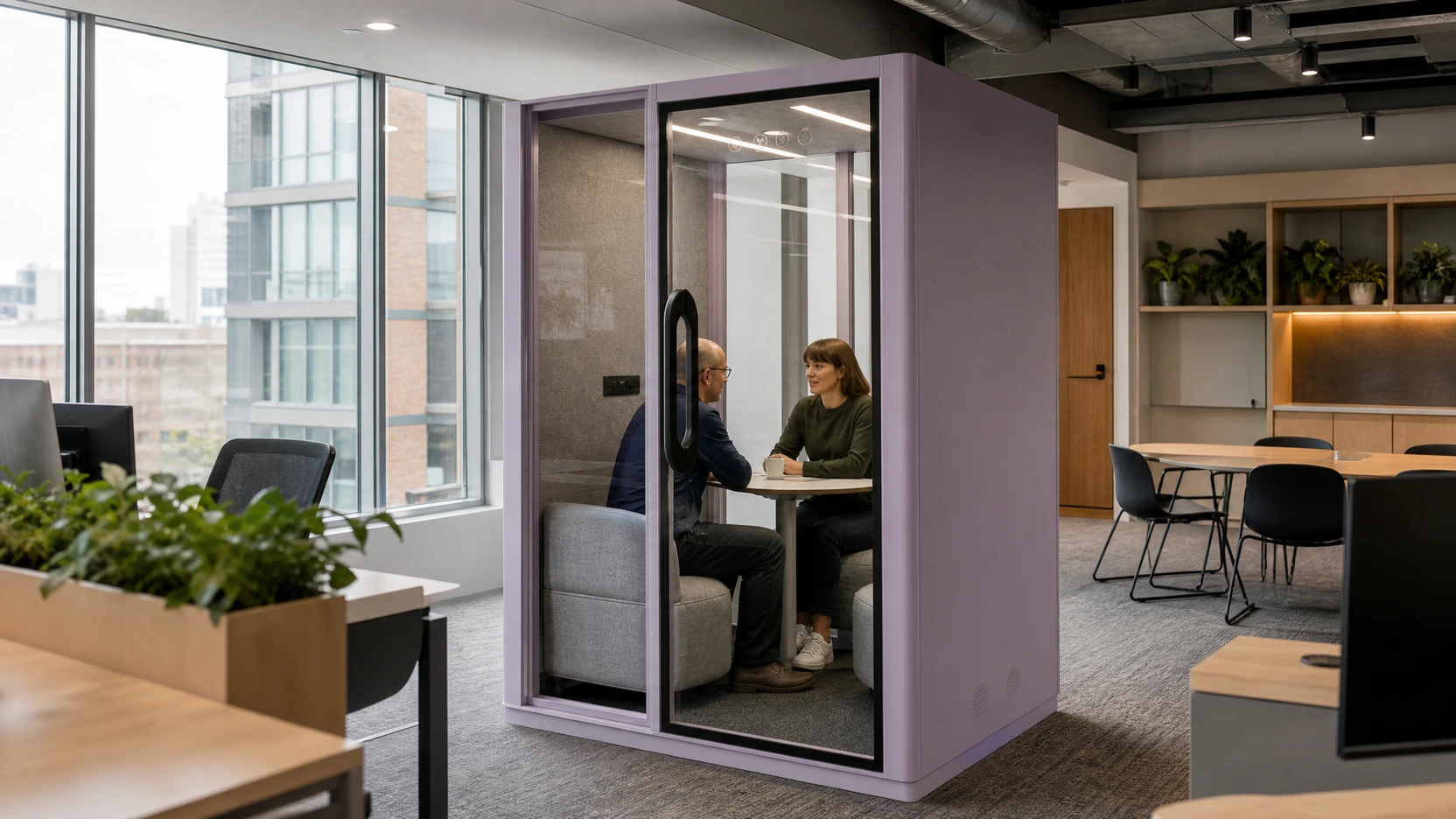 A MOVUSH two-person meeting pod installed within a working commercial office
